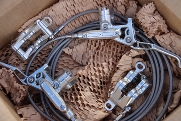 Radic brakes with hoses in a cardboard box